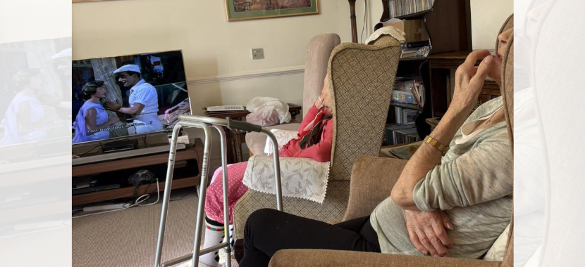 Residents enjoying a classic film afternoon featuring Singin’ in the Rain at The Old Vicarage care home in Otterton.